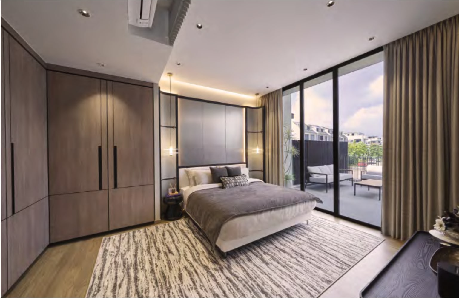 Interior picture of a master bedroom with a wardrobe wall and glass doors to a terrace