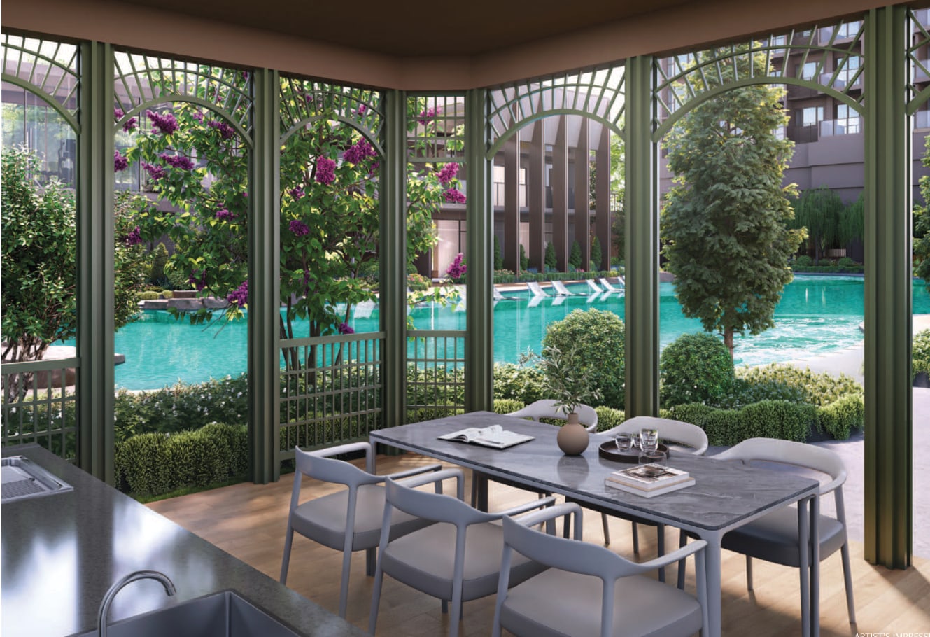 Artist's impression of a glass-walled pavilion with a dining table looking onto the pool
