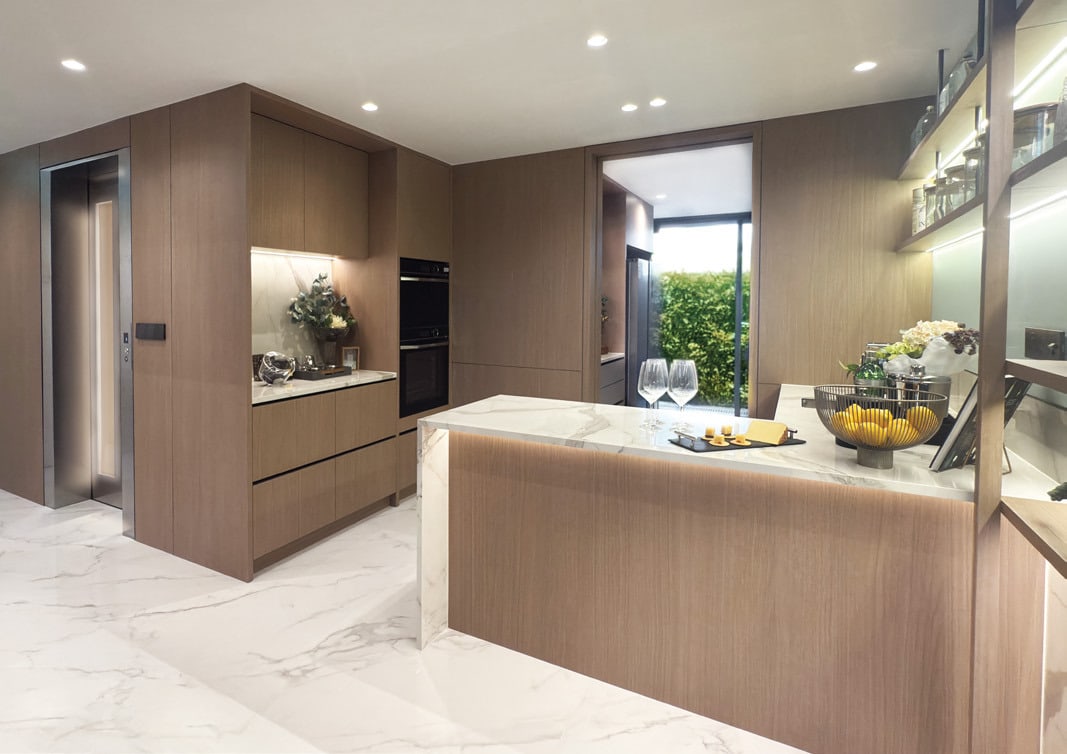 Artist's impression of the open dry kitchen with an island and the glass-door private lift