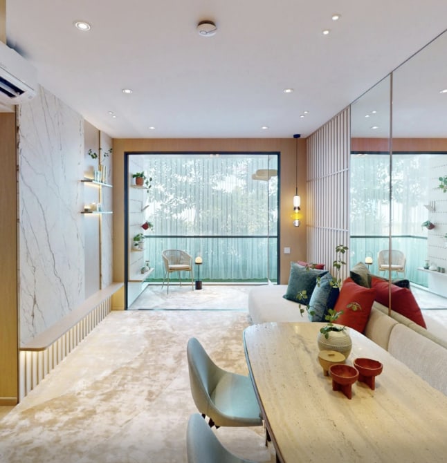 Living and dining area of a 3-bedroom home with study, with a glass door to the balcony