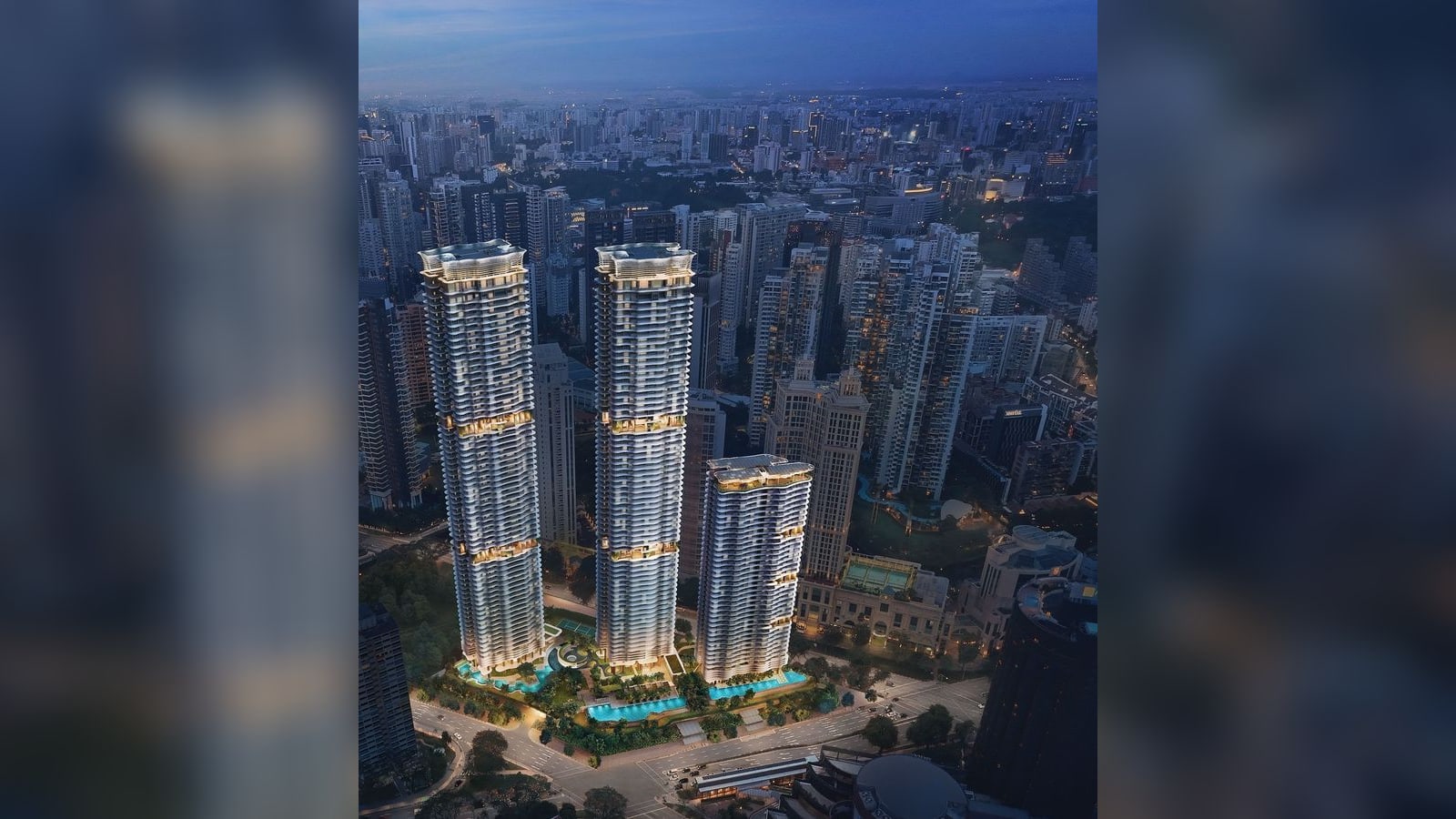 Artist's impression of the two residential towers and the shorter serviced-apartment tower of Zyon Grand seen from above at dusk, with the pools along the podium and the Havelock MRT entrance at the foot