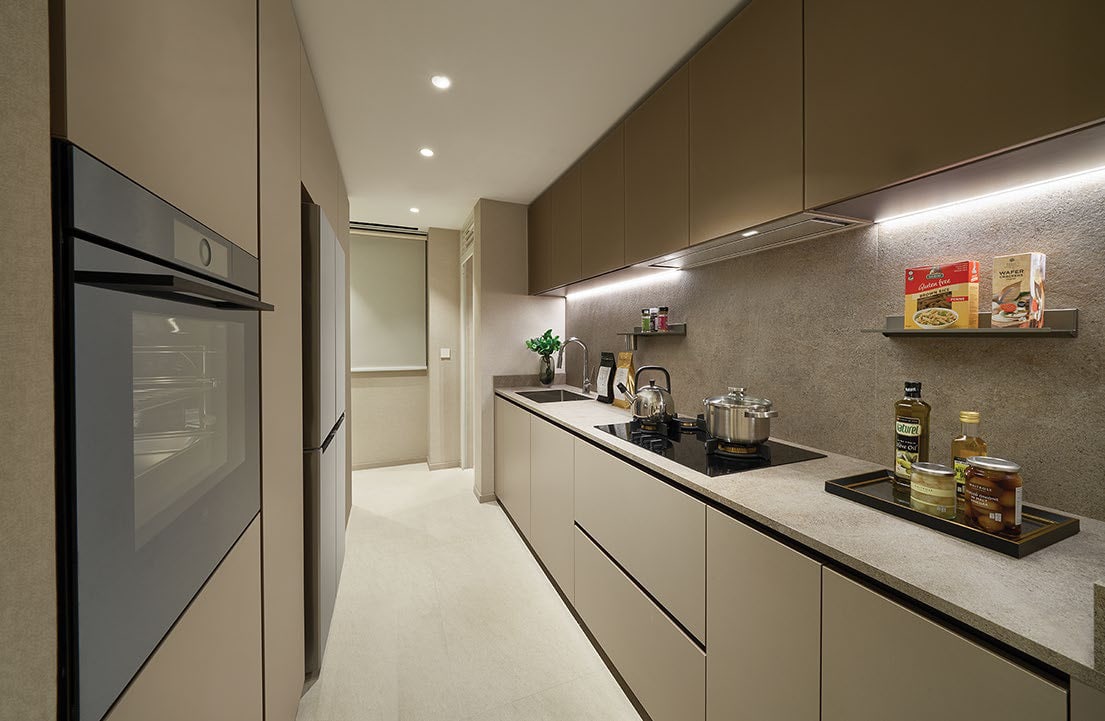 Artist's impression of a kitchen with a long counter, built-in oven and an accessories wall